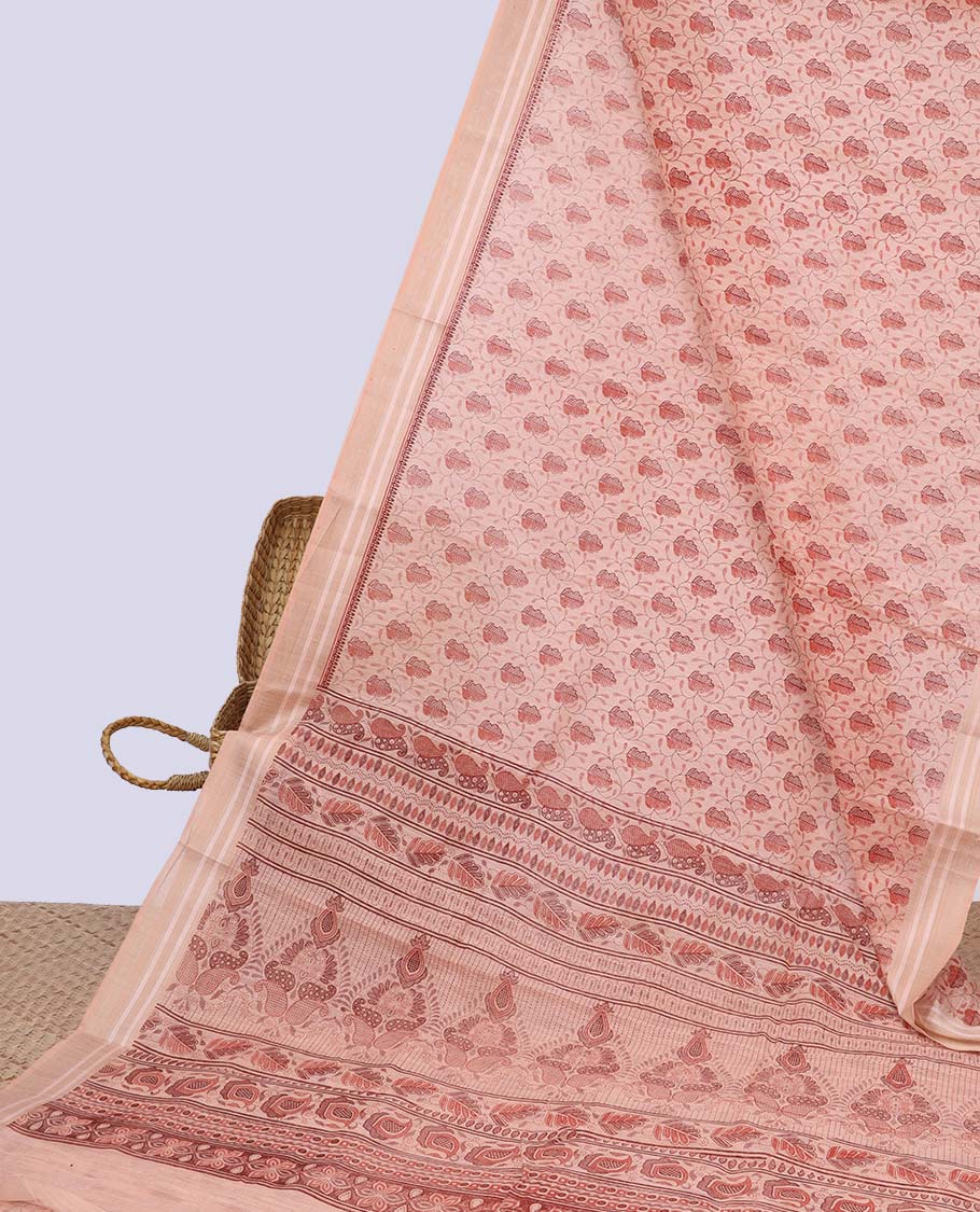 Orange intricately printed budget cotton saree, plain border & intricate pallu