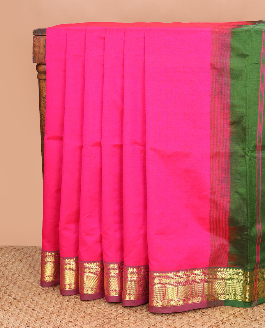 Pink plain poly cotton saree, traditional zari border, and contrast striped pallu