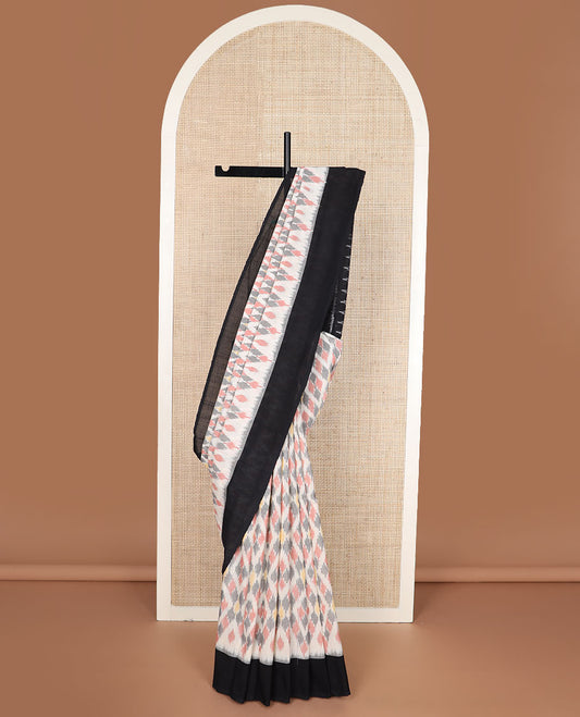 Cream-base multi-color jaal-patterned ikkat cotton saree, contrast plain border & chevron striped pallu