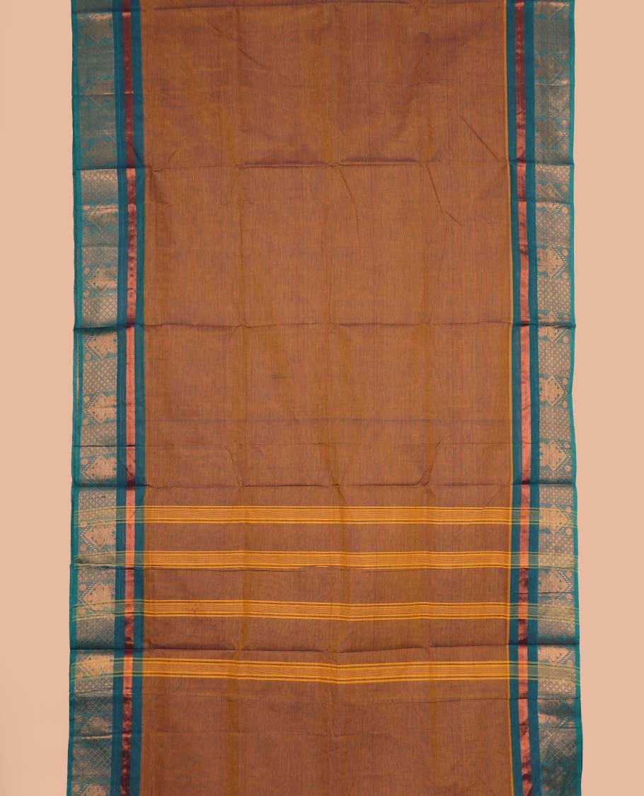 Mustard plain nine-yard cotton saree, contrast traditional zari border, and striped pallu