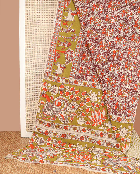 Terracotta batik floral printed Kalamkari cotton saree, contrast border, and pallu of peacock and floral designs