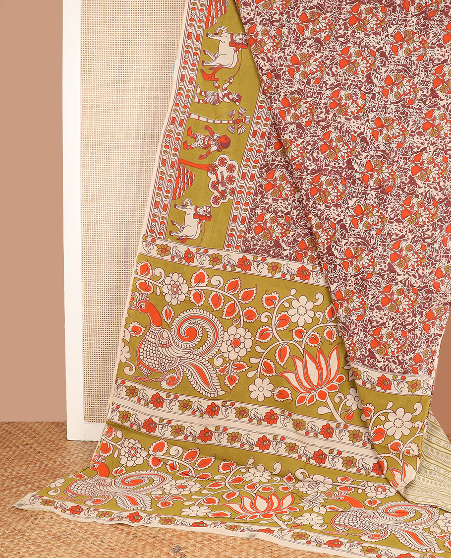 Terracotta batik floral printed Kalamkari cotton saree, contrast border, and pallu of peacock and floral designs