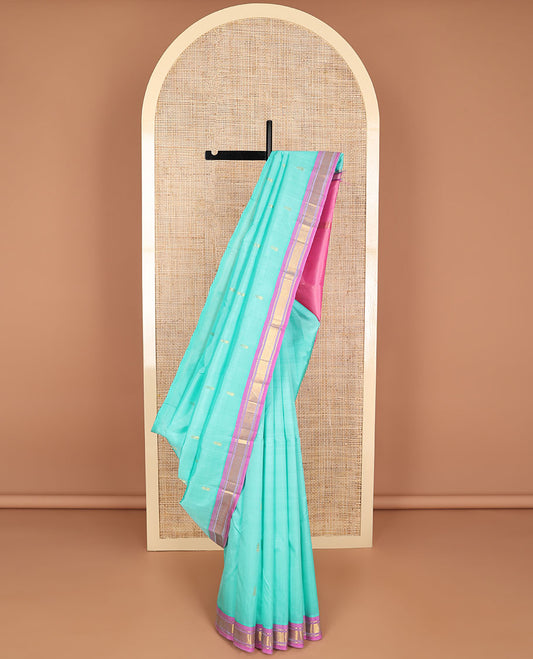 Light blue  floral buttas kancheepuram silk saree with contrast border of rekku, kayil kann design & floral design pallu