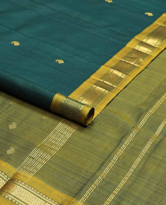 Dark green manga buttas kancheepuram silk saree with contrast border of  rekku, banaras, kuyil kann design & zari design pallu