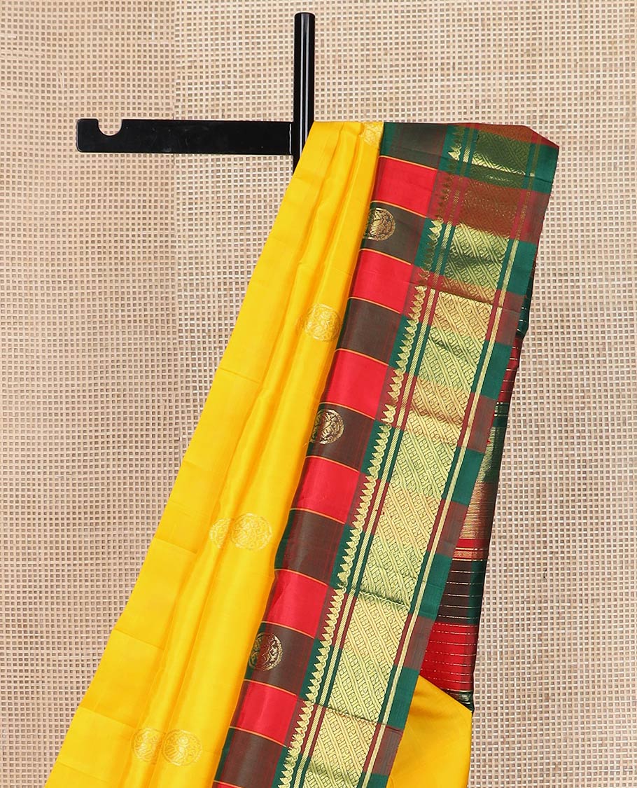 Yellow zari buttas kanchipuram silk saree, contrast one-sided checked thazampoo rekku round mayil zari border & zari woven pallu