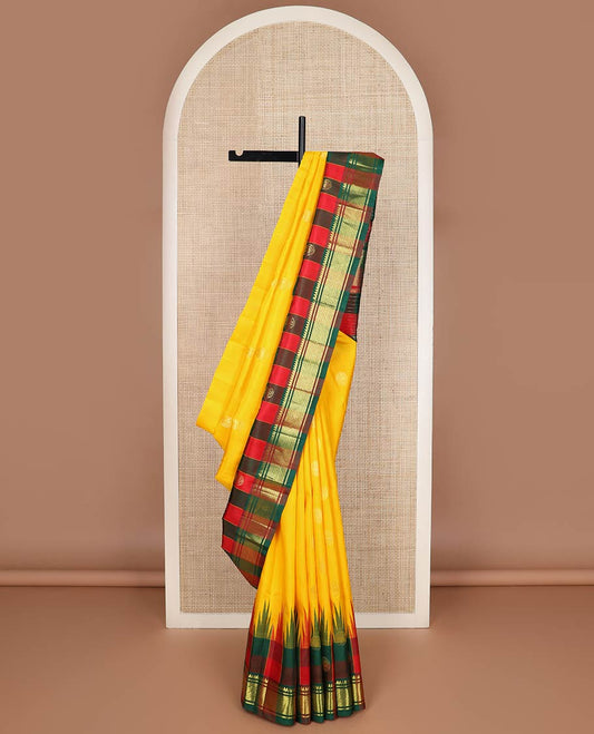 Yellow zari buttas kanchipuram silk saree, contrast one-sided checked thazampoo rekku round mayil zari border & zari woven pallu