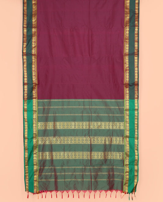 Wine Plain Ten-Yard Art Silk Saree, Complemented by a Contrast Traditional Zari Design Rettai Pettu Border of Rudraksham Motifs, and Pallu Featuring Rudraksham Designs