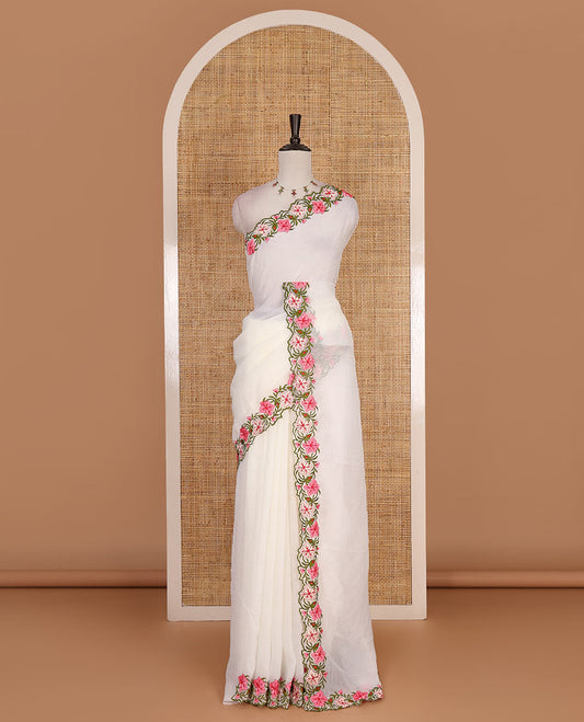 Half- white full-plain crunchy crushed saree, scallop floral creeper thread embroidered border, and floral embroidered matching blouse