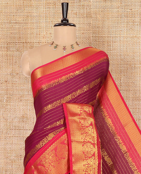Purple Moss Chiffon Saree, Mesmerized with Horizontal Stripes, Peacock, and Floral Buttas All Over Its Body, Complemented by a Contrast Traditional Zari Border, Pallu Mirrors the Same Design, and Paired with a Contrast Floral-Paisley Blouse