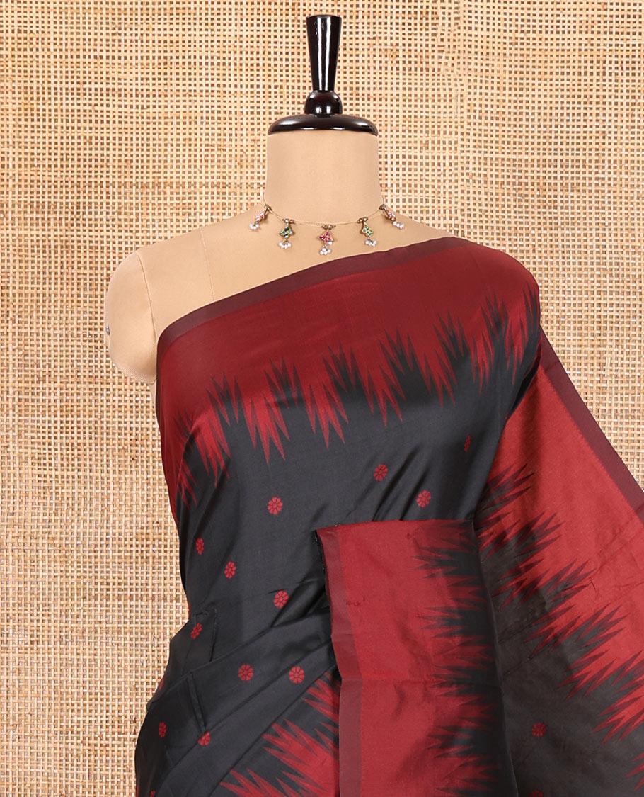 Black Kanchi Silk Saree, Subtly Woven with Flower Buttas All Over Its Body, Complemented by a Contrast Temple Border, Pallu Mirrors the Same Floral Motifs, and Paired with a Contrast Blouse