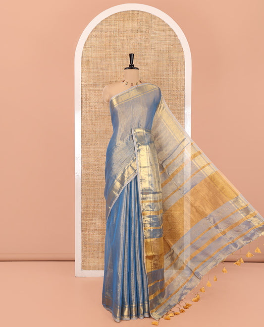Blue Plain Khadi Tissue Saree, a Gleaming Zari Bavanji Border, Golden Zari Striped Pallu, and Paired with a Matching Blouse