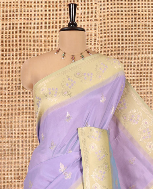 Lavender Elite Soft Silk Saree, Features Zari Buttas, Contrast Meenakari Floral Creeper Zari Border, Intricately Woven Pallu and a Contrast Blouse