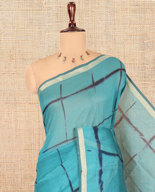 Rama Linen Cotton Saree, Adorned with Shibori Checks, a Subtle Piping Border, Geometric Pallu, and a Matching Blouse