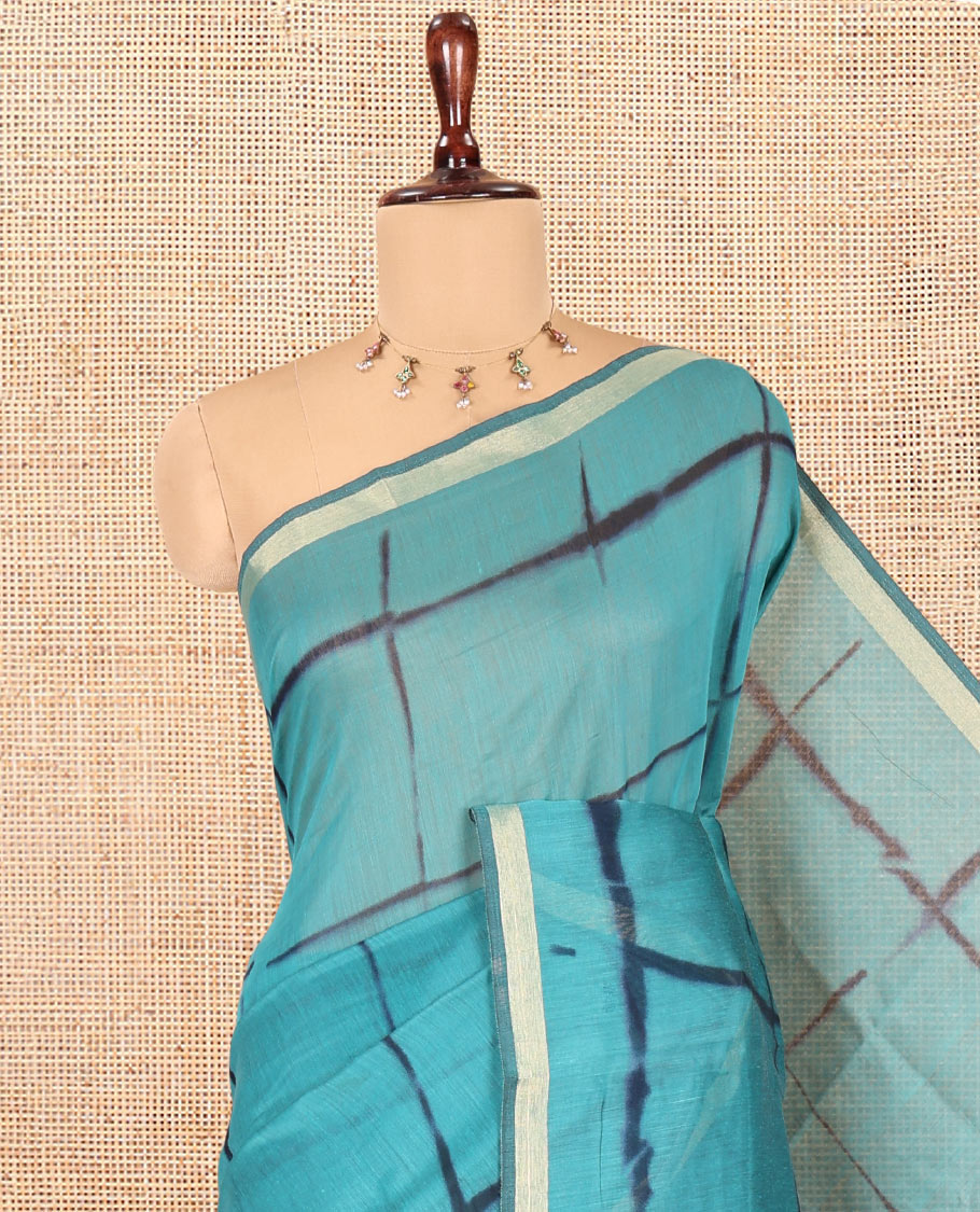 Rama Linen Cotton Saree, Adorned with Shibori Checks, a Subtle Piping Border, Geometric Pallu, and a Matching Blouse