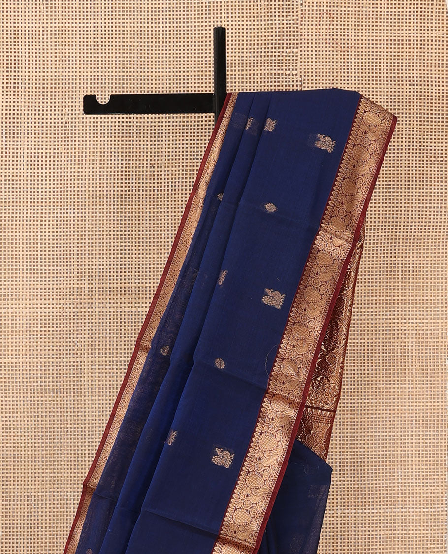 Blue peacock and chakra motifs silk cotton saree, contrast traditional zari border and pallu of butta enclosed checks