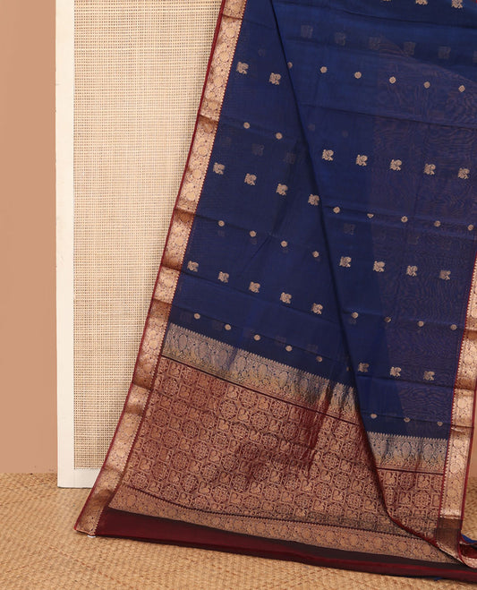 Blue peacock and chakra motifs silk cotton saree, contrast traditional zari border and pallu of butta enclosed checks