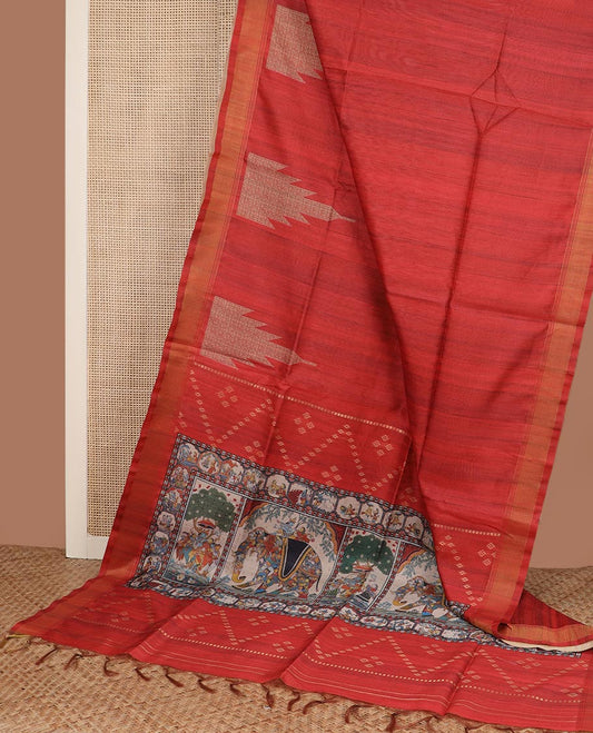 Red plain tussar silk saree, temple motifs zari bavanji border, and pallu printed ancient human, and elephant motifs