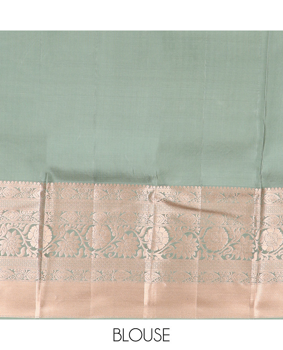 Green Kanchipuram Silk Saree Highlighted by Jacquard Design, Complemented by Zari Border of Thilakam Mokku, Manga, Jaal, and Kodi Visiry Designs, Pallu Elevated with Intricate Zari Designs, and Paired with a Matching Blouse