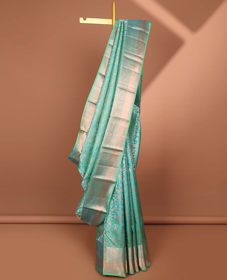 Green  jacquard kancheepuram silk saree with self floral zari border & intricate zari design pallu