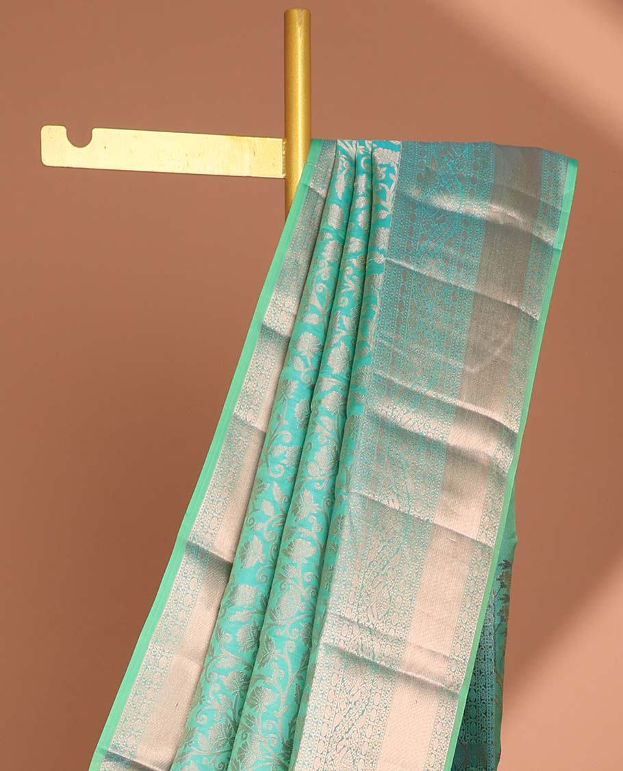 Green  jacquard kancheepuram silk saree with self floral zari border & intricate zari design pallu