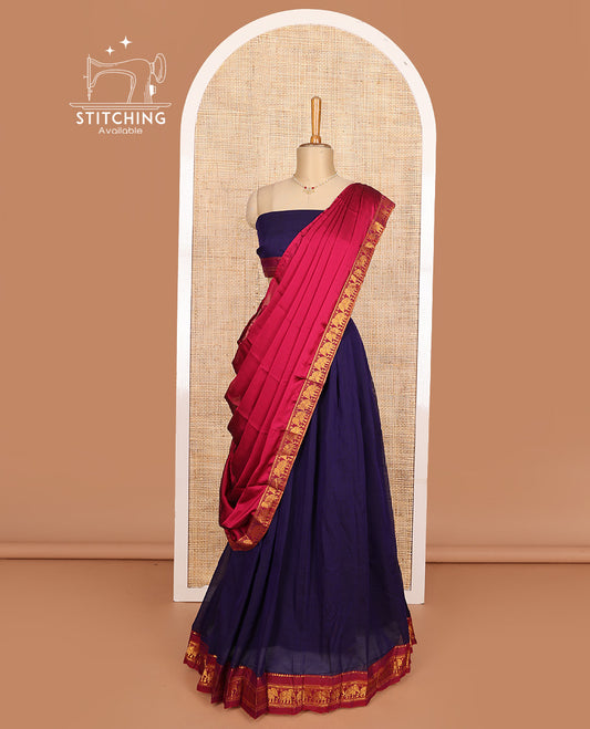 Blue cotton half-saree, plain with contrast elephant motif bordered skirt, matching blouse, and contrast elephant motif dhavani
