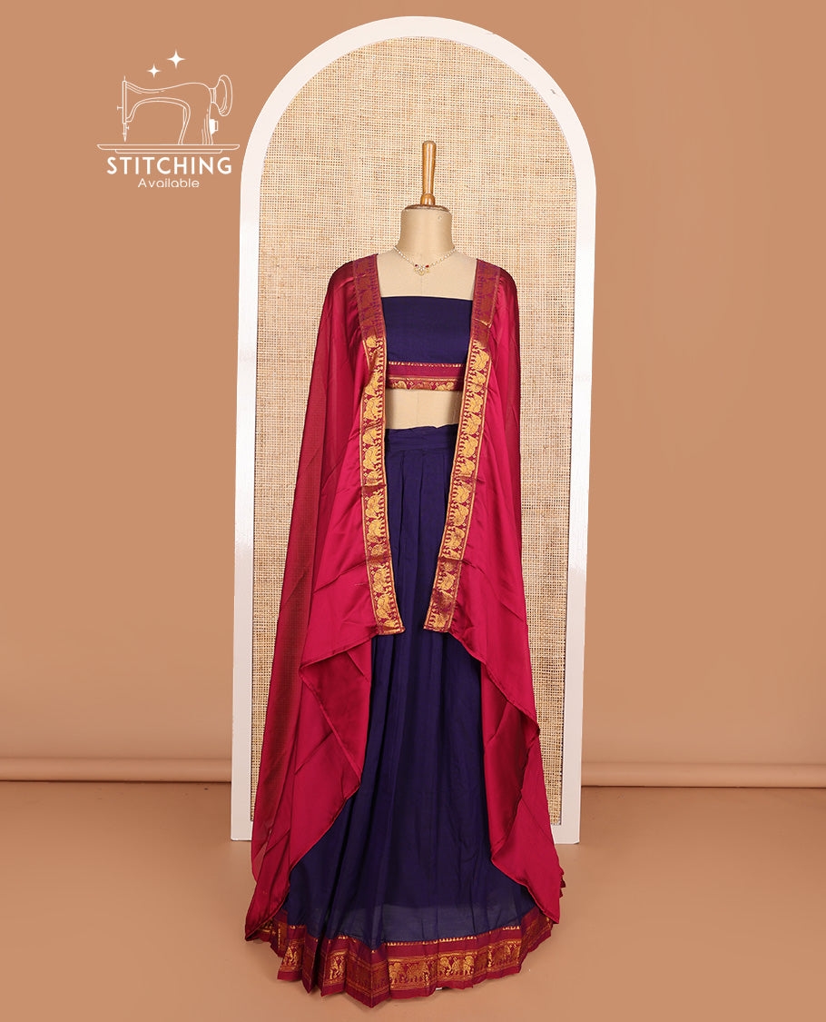 Blue cotton half-saree, plain with contrast elephant motif bordered skirt, matching blouse, and contrast elephant motif dhavani