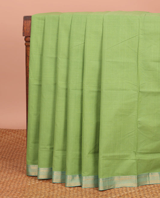 Green Plain Mangalagiri Cotton Saree, Complemented by Contrast Traditional Zari Design Border, Gleaming Zari Pallu, and Paired with a Matching Blouse