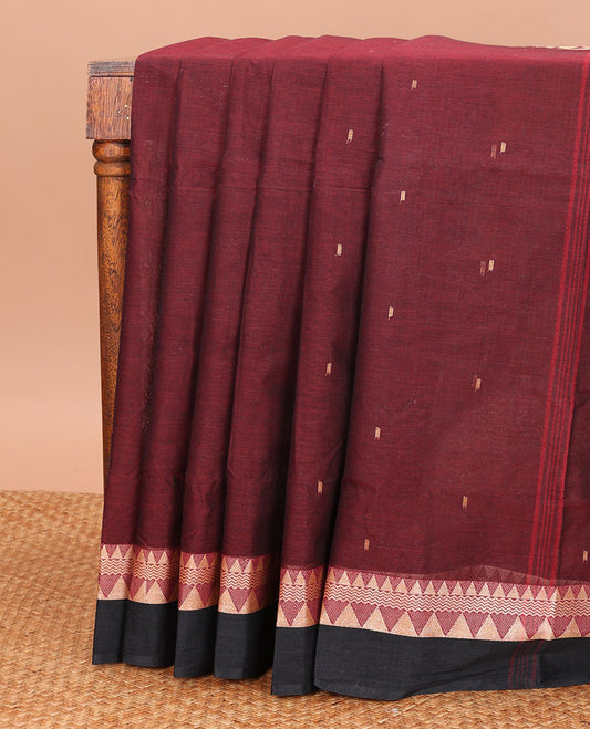 Maroon Bengal Cotton Saree, Detailed with Buttas All Over Its Body, Complemented by Contrast Temple Design Border, and Pallu Steeped with Stripes