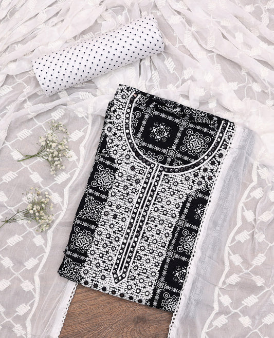 Black Material Chudidar Set, Elevated with Intricately Printed and Neck Embroidery  Rayon Top, a Contrast Polka Dot Printed Bottom, and Paired with Embroidered Chiffon Dupatta