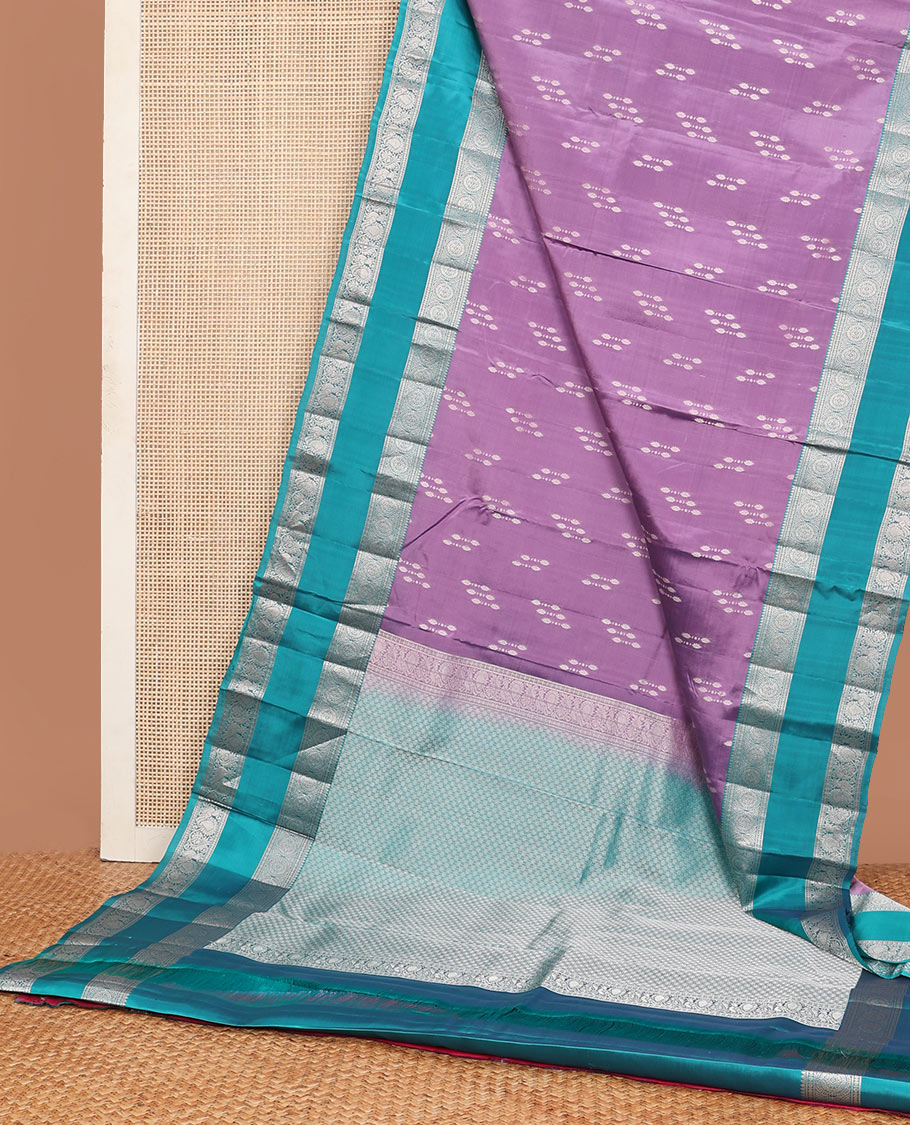 Light purple zari buttas Vasundhara silk mix saree, contrast rettai pettu border of Annam chakram motifs & intricate pallu