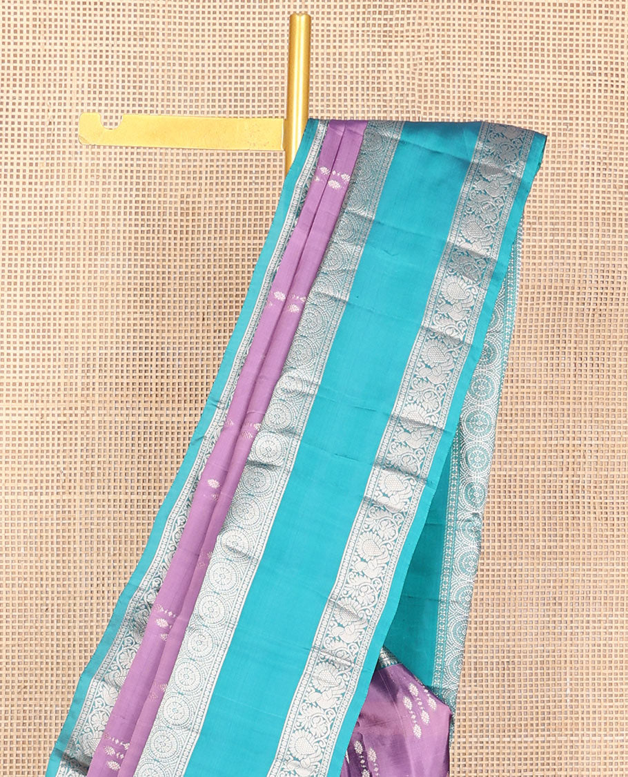Light purple zari buttas Vasundhara silk mix saree, contrast rettai pettu border of Annam chakram motifs & intricate pallu