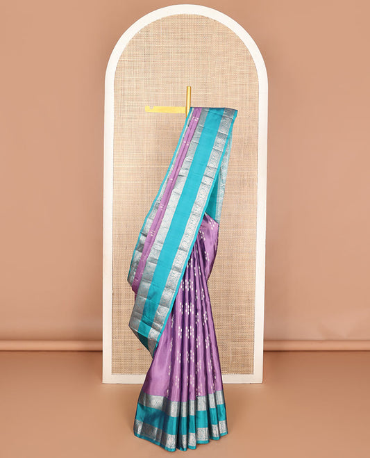 Light purple zari buttas Vasundhara silk mix saree, contrast rettai pettu border of Annam chakram motifs & intricate pallu