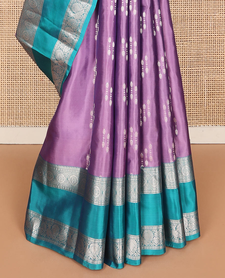 Light purple zari buttas Vasundhara silk mix saree, contrast rettai pettu border of Annam chakram motifs & intricate pallu