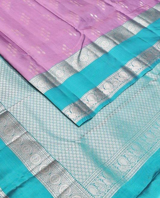 Light purple zari buttas Vasundhara silk mix saree, contrast rettai pettu border of Annam chakram motifs & intricate pallu
