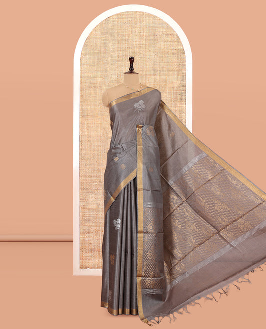 Grey Tussar Saree, Showcasing Floral Buttas, a Subtle Zari Border, Pallu of Polka Dot and Floral Designs, and a Matching Blouse