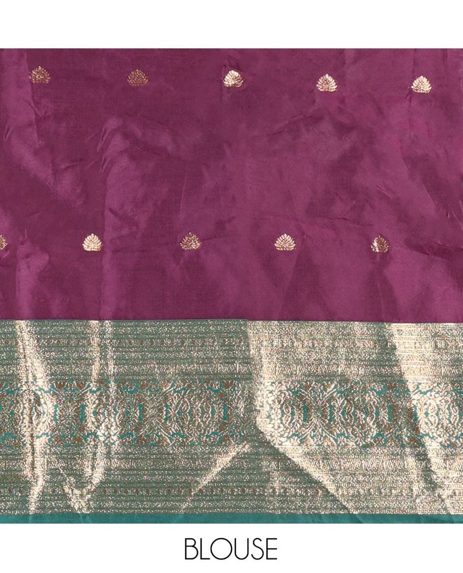 Purple and Green Semi-Banarasi Half-Saree, Beautified with Zari Buttas on Its Skirt, Complemented by a Contrast Traditional Zari Design Woven Border, Paired with a Matching Blouse, and a Contrast Satin Georgette Embroidered Scallop Dhavani