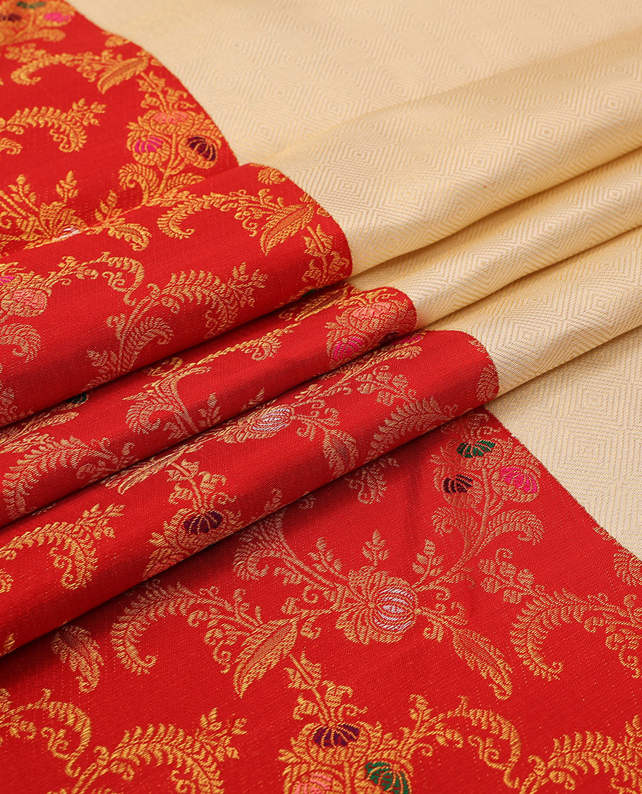 Cream embossed silk saree, contrast red border & pallu features meenakari resham thread woven floral jaal design