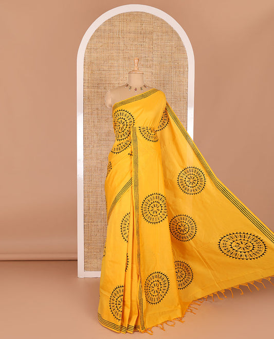 Yellow warli village theme printed South cotton saree, block printed border, warli printed pallu, a matching blouse, and a contrast floral vine printed blouse
