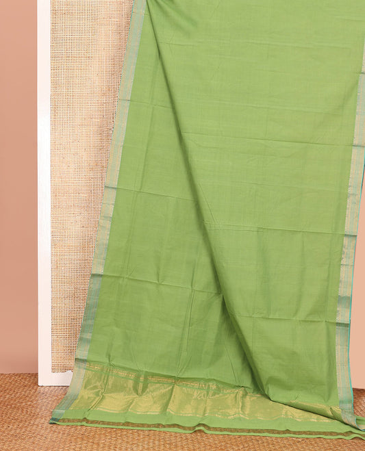 Green Plain Mangalagiri Cotton Saree, Complemented by Contrast Traditional Zari Design Border, Gleaming Zari Pallu, and Paired with a Matching Blouse