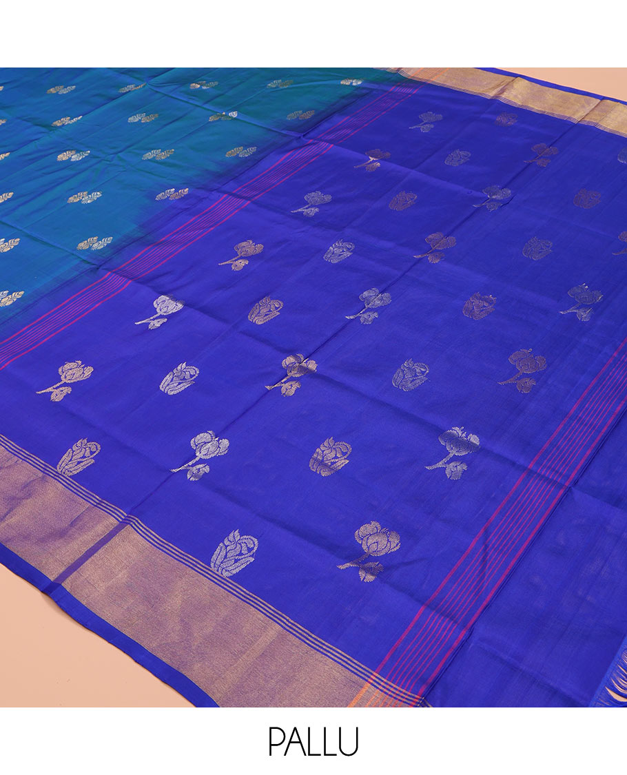 Blue Uppada Silk Saree, Embellished with Zari Buttas on Its Body, Complemented by Contrast Border, Pallu Steeped with Floral Zari Buttas, and Paired with a Contrast Blouse