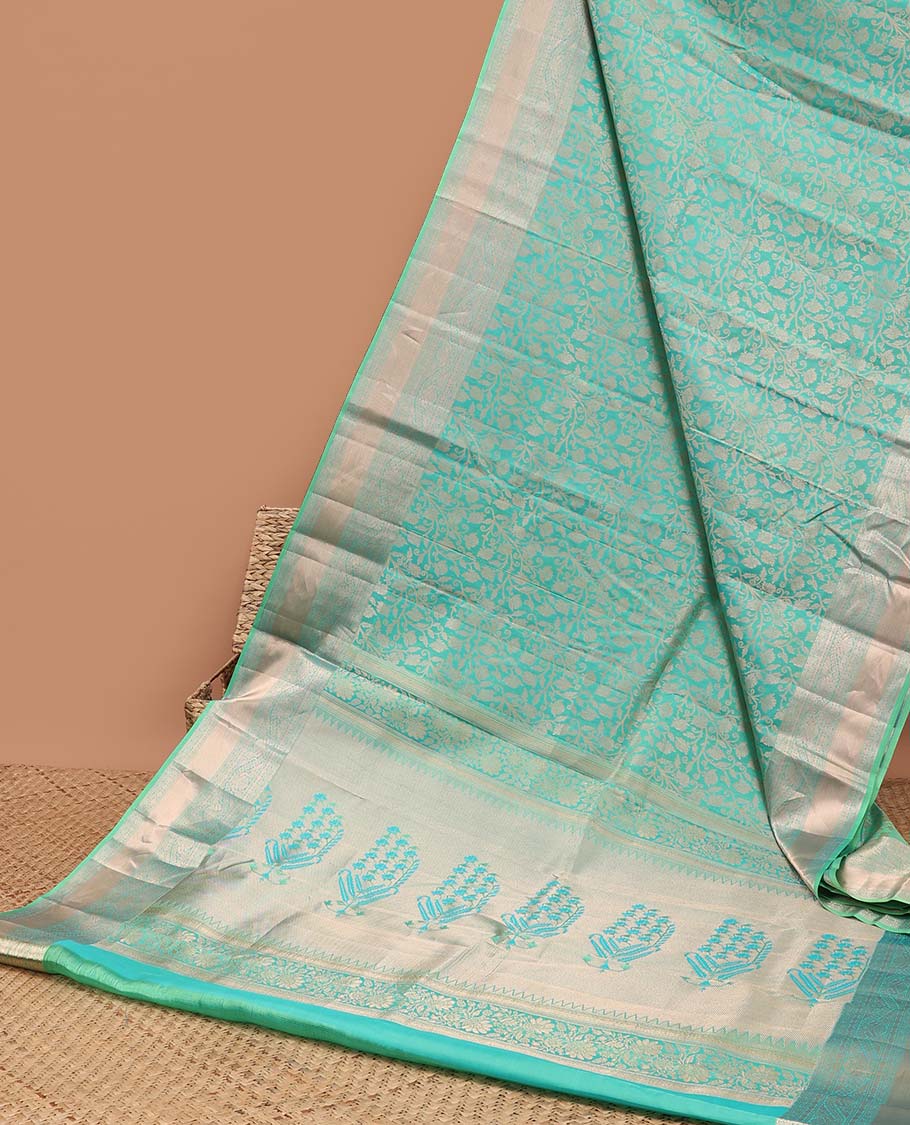 Green  jacquard kancheepuram silk saree with self floral zari border & intricate zari design pallu