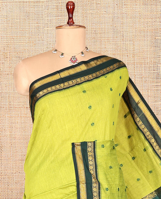 Leaf Green Kalyani Cotton Saree, Finely Crafted with Thread Buttas, a Contrast Traditional Rettai Pettu Zari Border, Grand Pallu, and a Contrast Blouse