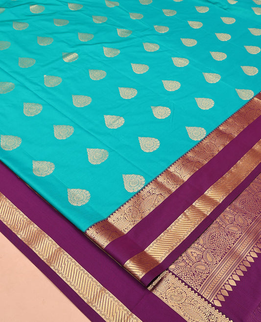 Rama Green and Purple Budget Silk Saree, Accentuated with Zari Buttas All Over Its Body, Complemented by Contrast Rettai Pettu Traditional Zari Designs Woven Border, Grand Pallu and Paired with a Contrast Blouse