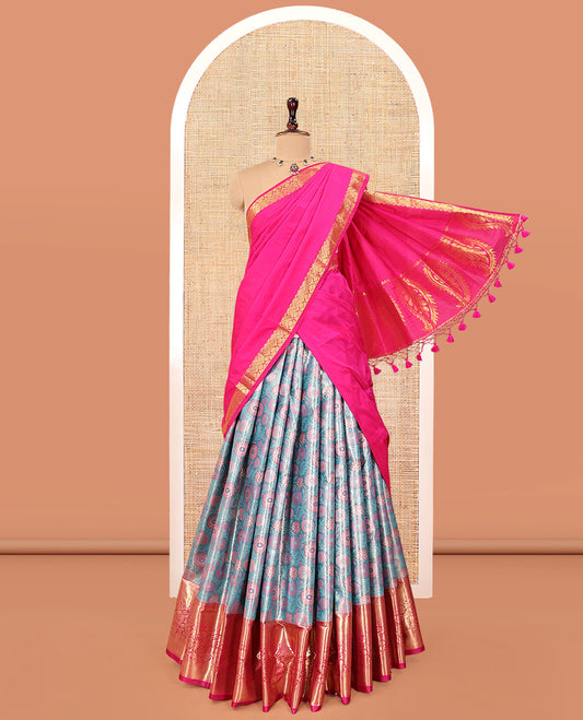 Blue Art Silk Material Half Saree Set, Embellished with Floral Jacquard Design Skirt, a Contrast Floral Design Border, Contrast Blouse, and an Intricate Dhavani