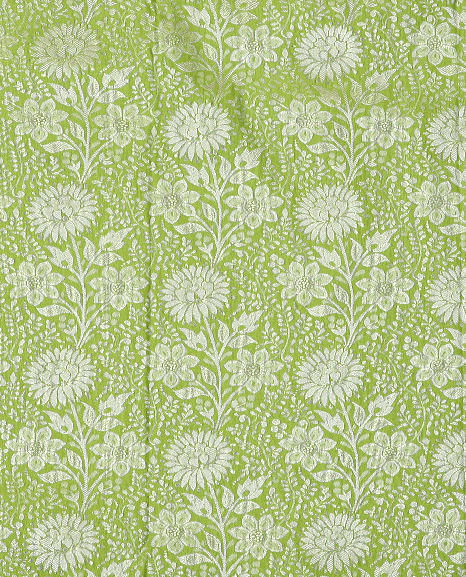 Light Green Art Silk Material Half Saree Set Featuring Floral Jacquard Skirt, a Contrast Traditional Zari-Design Border, a Zari-Bordered Blouse, and a Dhavani Elevated with Floral Zari Designs