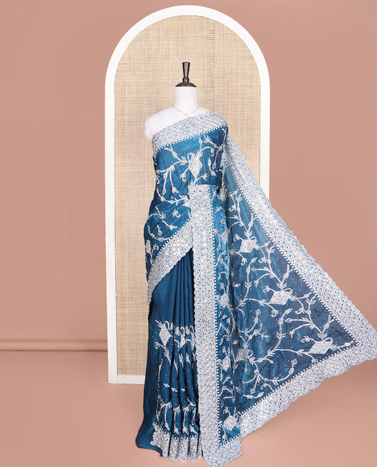 Blue Designer Saree, Richly Detailed with Floral-Jaal Style Mixed Embroidery on Its Body, Highlighted by Jaal-Patterned Scallop Embroidered Border, Self-Design Pallu, and Paired with a Heavy Embroidered Matching Blouse