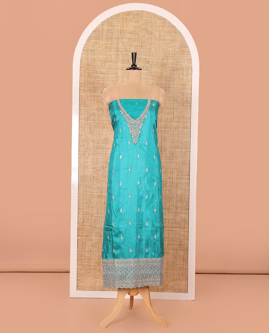 Green Material Chudidar Set Prettified with Intricately Embroidered Muga Silk Top, Subtly Made Plain Santoon Bottom, and a Bemberg Chiffon Dupatta Featuring Floral Printed, and Embroidery