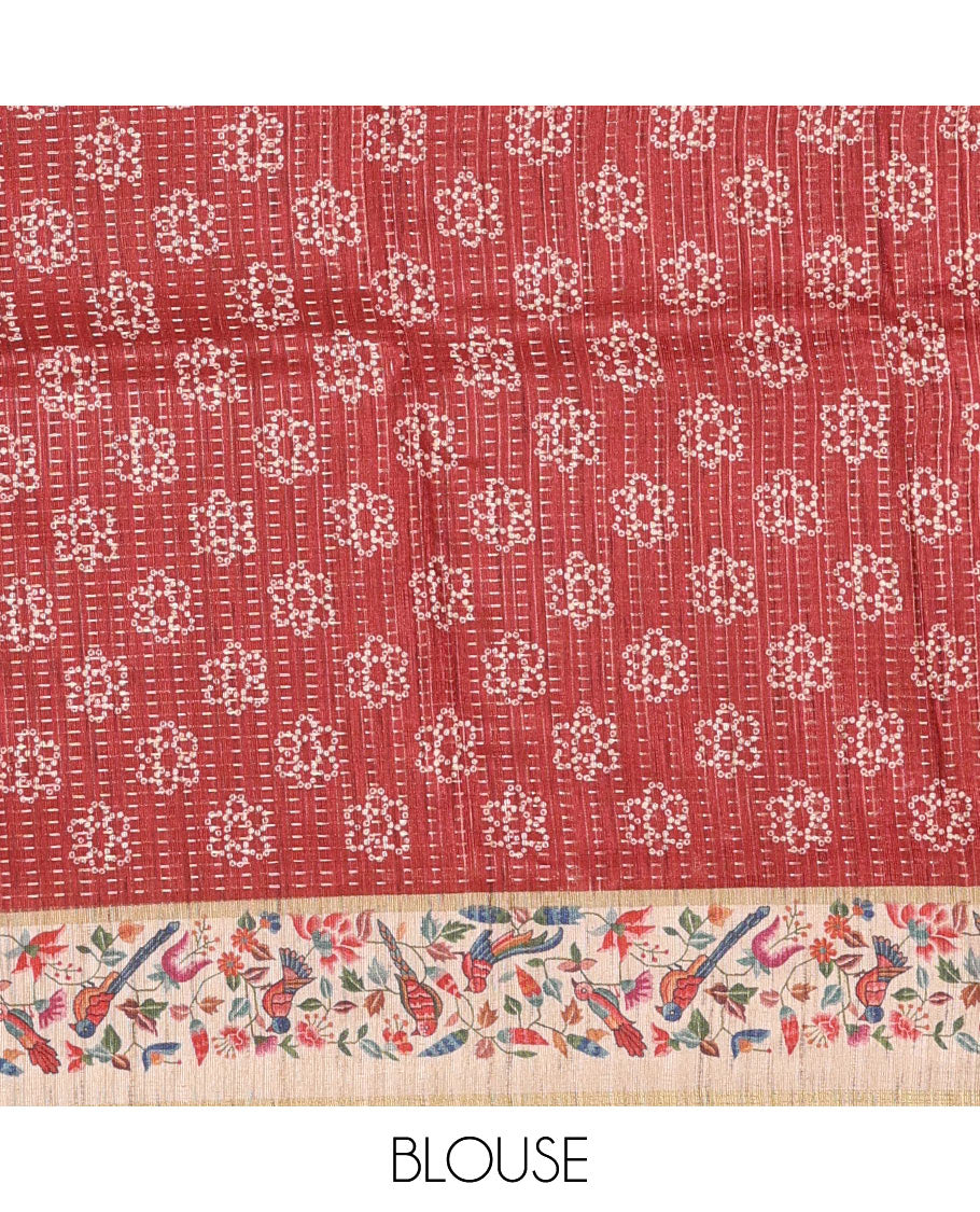 Rust zari buttas and bandhani dotted fancy tussar saree, contrast floral and bird printed border, striped pallu, and a matching blouse