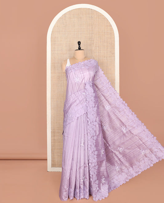 Lavender Fancy Tussar Saree, Gracefully Embellished with Floral Embroidery, a Scallop Embroidered Border, and a Matching Blouse