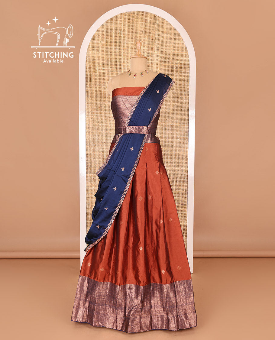 Rust taffeta silk half-saree, zari buttas and contrast traditional zari bordered skirt, a matching taffeta silk blouse, and contrast embroidered satin georgette  dhavani
